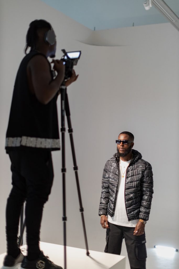 a man standing in front of a camera